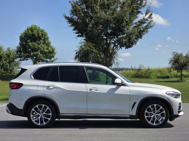 Білий БМВ Х5, об'ємом двигуна 3 л та пробігом 60 тис. км за 27000 $, фото 3 на Automoto.ua