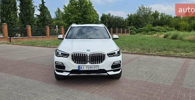 Белый БМВ Х5, объемом двигателя 3 л и пробегом 57 тыс. км за 50200 $, фото 8 на Automoto.ua