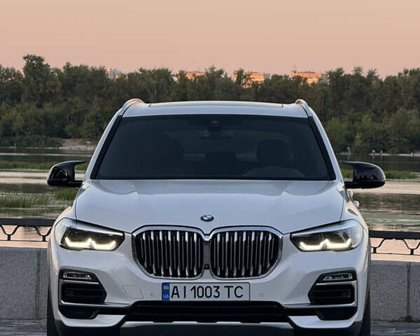 Белый БМВ Х5, объемом двигателя 3 л и пробегом 65 тыс. км за 49800 $, фото 4 на Automoto.ua