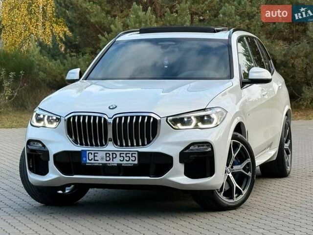 Белый БМВ Х5, объемом двигателя 3 л и пробегом 130 тыс. км за 58700 $, фото 3 на Automoto.ua