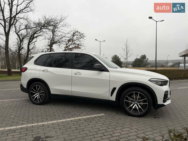 Білий БМВ Х5, об'ємом двигуна 2 л та пробігом 57 тис. км за 61000 $, фото 4 на Automoto.ua
