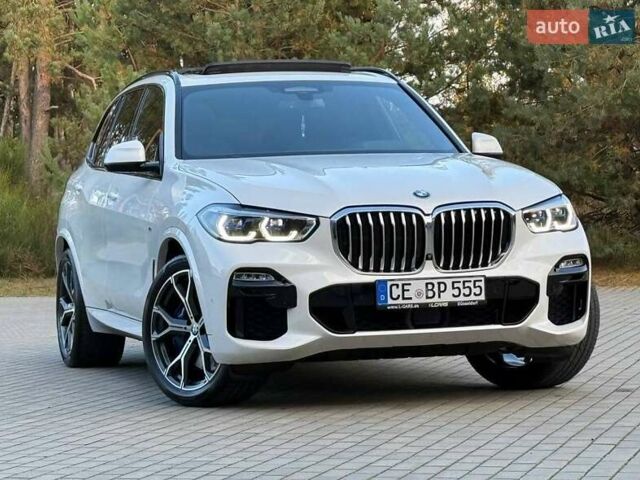 Белый БМВ Х5, объемом двигателя 3 л и пробегом 130 тыс. км за 58700 $, фото 21 на Automoto.ua