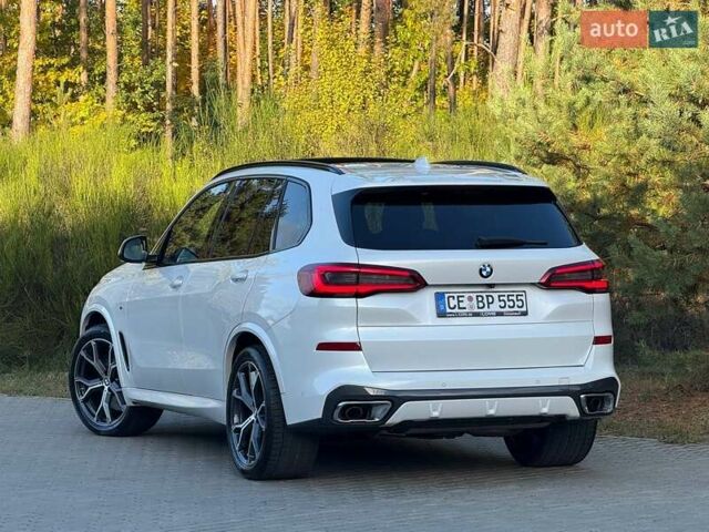 Белый БМВ Х5, объемом двигателя 3 л и пробегом 130 тыс. км за 58700 $, фото 32 на Automoto.ua