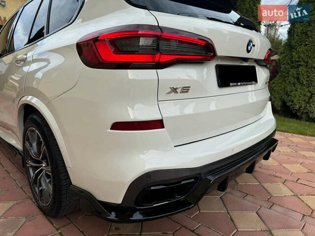 Белый БМВ Х5, объемом двигателя 3 л и пробегом 124 тыс. км за 49000 $, фото 14 на Automoto.ua