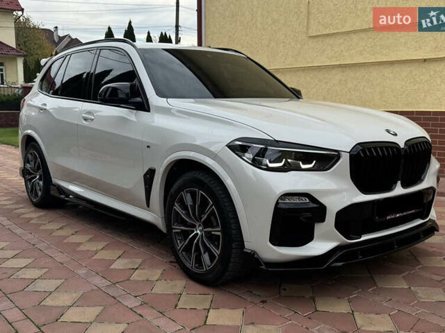 Белый БМВ Х5, объемом двигателя 3 л и пробегом 124 тыс. км за 49000 $, фото 1 на Automoto.ua