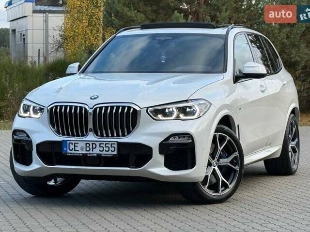 Белый БМВ Х5, объемом двигателя 3 л и пробегом 130 тыс. км за 58700 $, фото 1 на Automoto.ua