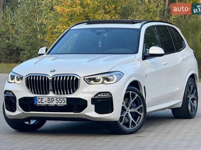 Белый БМВ Х5, объемом двигателя 3 л и пробегом 130 тыс. км за 58700 $, фото 20 на Automoto.ua