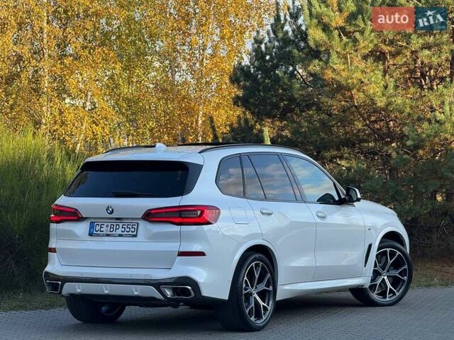 Белый БМВ Х5, объемом двигателя 3 л и пробегом 130 тыс. км за 58700 $, фото 33 на Automoto.ua