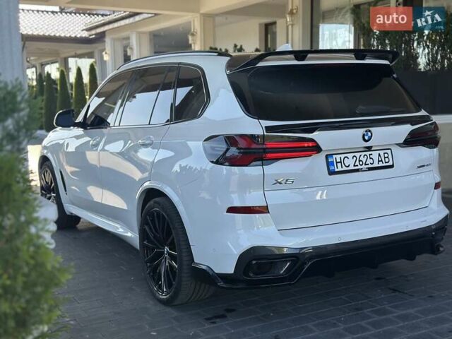 Білий БМВ Х5, об'ємом двигуна 3 л та пробігом 74 тис. км за 52900 $, фото 5 на Automoto.ua