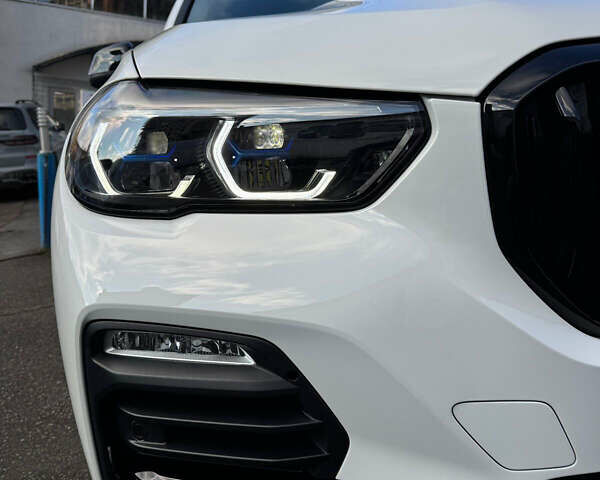 Белый БМВ Х5, объемом двигателя 2 л и пробегом 68 тыс. км за 56500 $, фото 14 на Automoto.ua