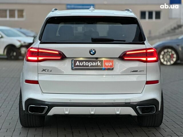 Белый БМВ Х5, объемом двигателя 3 л и пробегом 80 тыс. км за 55980 $, фото 4 на Automoto.ua