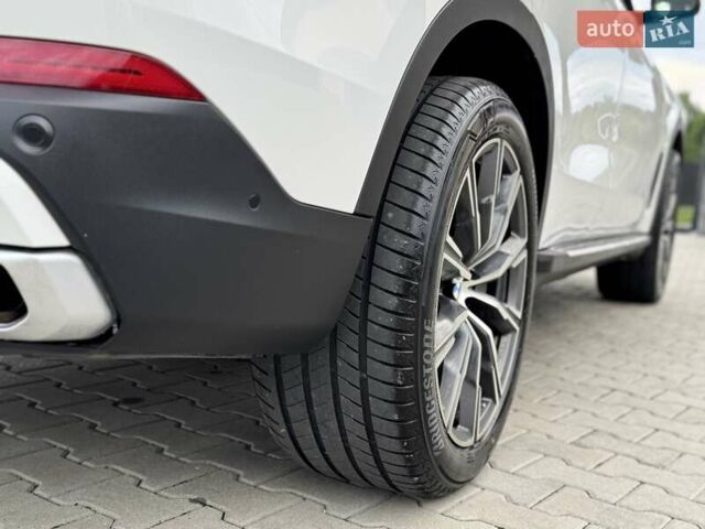 Білий БМВ Х5, об'ємом двигуна 2 л та пробігом 74 тис. км за 54200 $, фото 37 на Automoto.ua