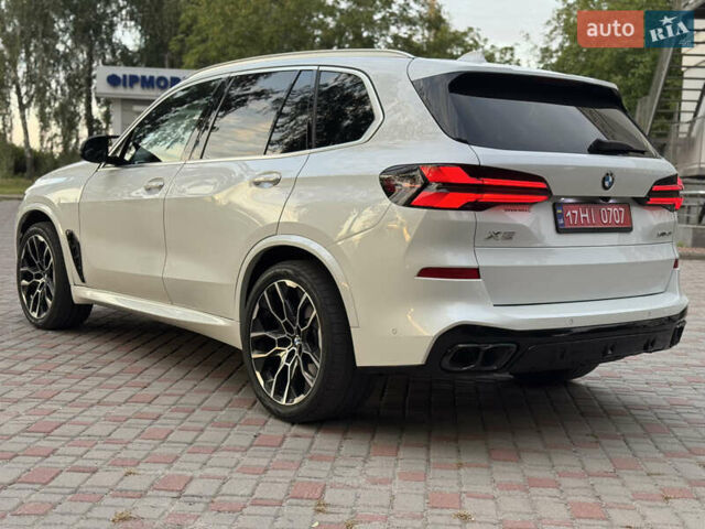 Белый БМВ Х5, объемом двигателя 3 л и пробегом 74 тыс. км за 55000 $, фото 34 на Automoto.ua