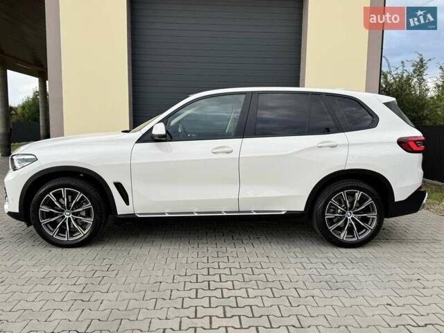 Білий БМВ Х5, об'ємом двигуна 2 л та пробігом 74 тис. км за 54200 $, фото 47 на Automoto.ua