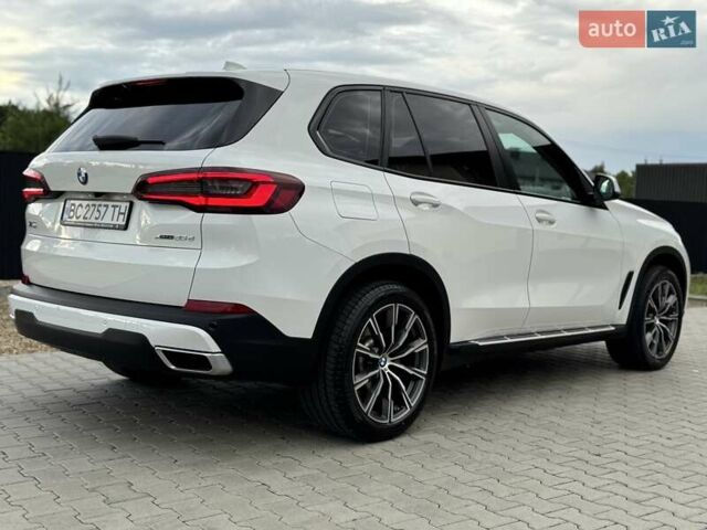 Білий БМВ Х5, об'ємом двигуна 2 л та пробігом 74 тис. км за 54200 $, фото 11 на Automoto.ua