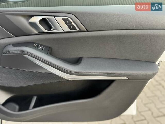 Білий БМВ Х5, об'ємом двигуна 2 л та пробігом 74 тис. км за 54200 $, фото 74 на Automoto.ua