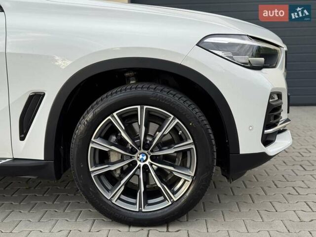 Білий БМВ Х5, об'ємом двигуна 2 л та пробігом 74 тис. км за 54200 $, фото 45 на Automoto.ua