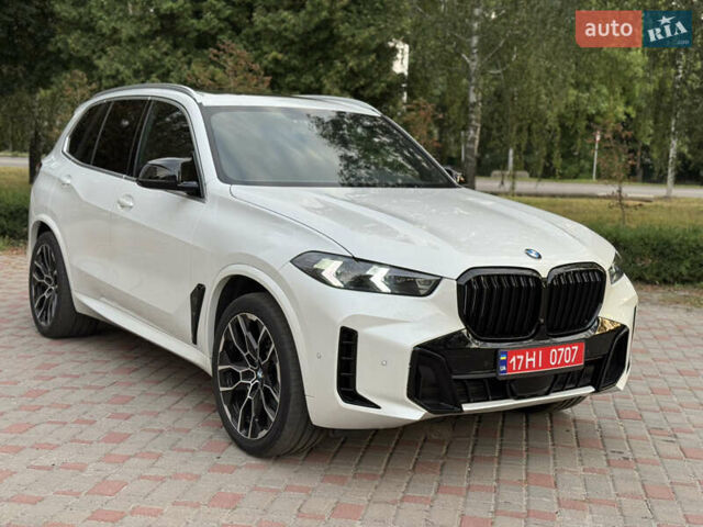 Белый БМВ Х5, объемом двигателя 3 л и пробегом 74 тыс. км за 55000 $, фото 1 на Automoto.ua