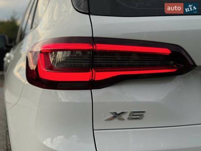 Білий БМВ Х5, об'ємом двигуна 2 л та пробігом 74 тис. км за 54200 $, фото 15 на Automoto.ua