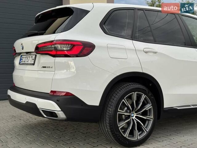 Білий БМВ Х5, об'ємом двигуна 2 л та пробігом 74 тис. км за 54200 $, фото 42 на Automoto.ua