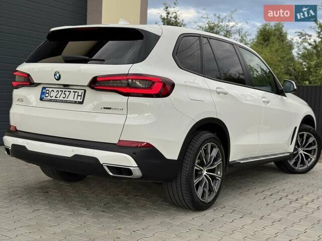 Білий БМВ Х5, об'ємом двигуна 2 л та пробігом 74 тис. км за 54200 $, фото 41 на Automoto.ua