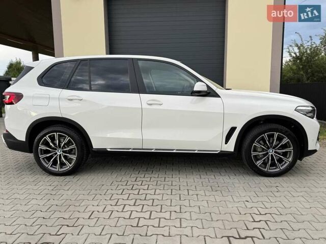 Білий БМВ Х5, об'ємом двигуна 2 л та пробігом 74 тис. км за 54200 $, фото 39 на Automoto.ua