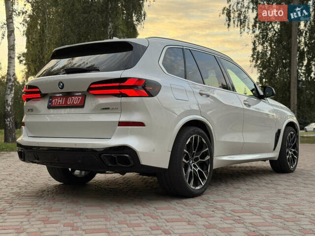 Белый БМВ Х5, объемом двигателя 3 л и пробегом 74 тыс. км за 55000 $, фото 37 на Automoto.ua