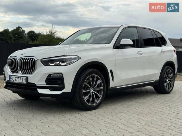 Білий БМВ Х5, об'ємом двигуна 2 л та пробігом 74 тис. км за 54200 $, фото 31 на Automoto.ua