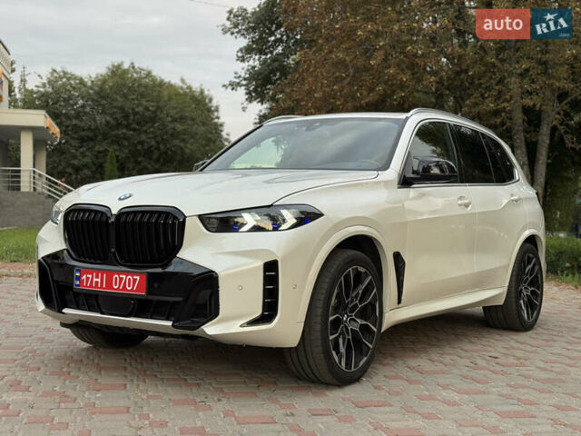 Белый БМВ Х5, объемом двигателя 3 л и пробегом 74 тыс. км за 55000 $, фото 6 на Automoto.ua