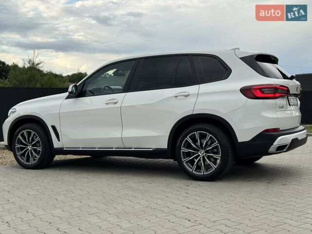 Білий БМВ Х5, об'ємом двигуна 2 л та пробігом 74 тис. км за 54200 $, фото 22 на Automoto.ua
