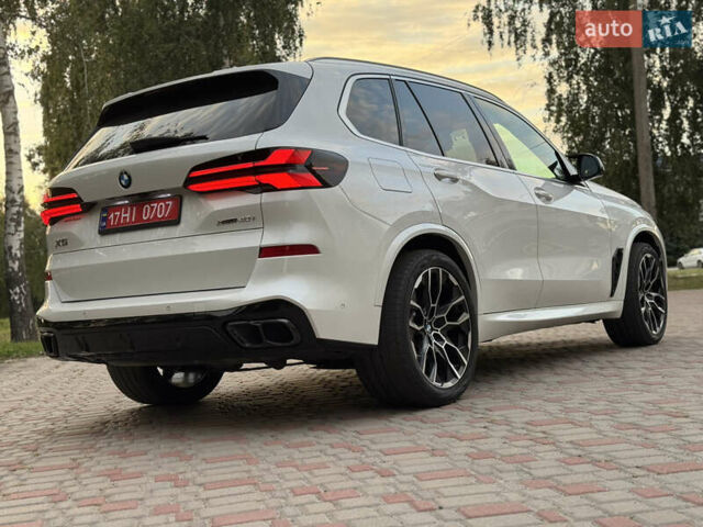 Белый БМВ Х5, объемом двигателя 3 л и пробегом 74 тыс. км за 55000 $, фото 33 на Automoto.ua