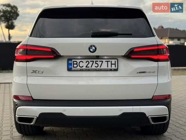 Білий БМВ Х5, об'ємом двигуна 2 л та пробігом 74 тис. км за 54200 $, фото 51 на Automoto.ua