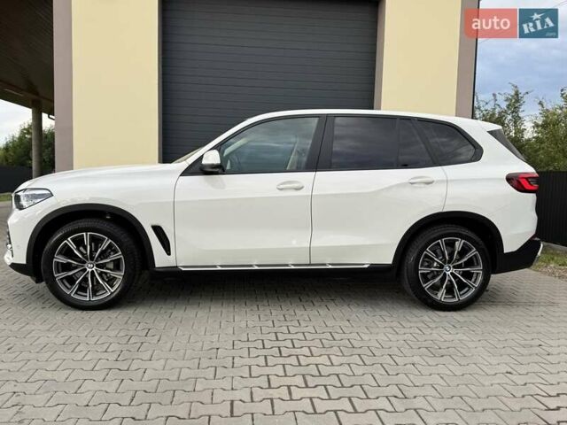 Білий БМВ Х5, об'ємом двигуна 2 л та пробігом 74 тис. км за 54200 $, фото 48 на Automoto.ua