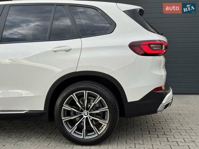 Білий БМВ Х5, об'ємом двигуна 2 л та пробігом 74 тис. км за 54200 $, фото 49 на Automoto.ua