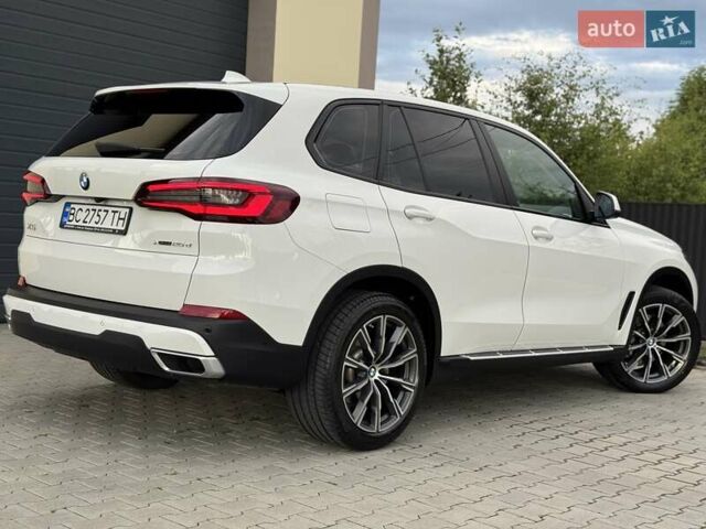 Білий БМВ Х5, об'ємом двигуна 2 л та пробігом 74 тис. км за 54200 $, фото 44 на Automoto.ua