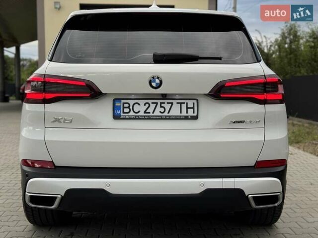 Білий БМВ Х5, об'ємом двигуна 2 л та пробігом 74 тис. км за 54200 $, фото 52 на Automoto.ua