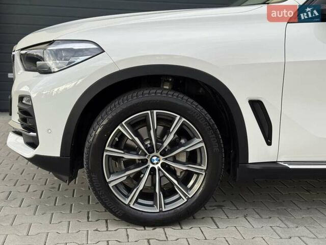 Білий БМВ Х5, об'ємом двигуна 2 л та пробігом 74 тис. км за 54200 $, фото 50 на Automoto.ua