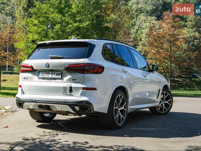 Белый БМВ Х5, объемом двигателя 3 л и пробегом 63 тыс. км за 74900 $, фото 7 на Automoto.ua