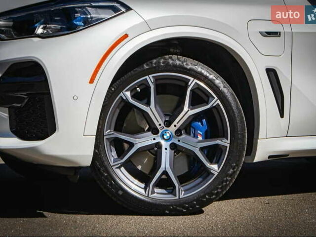 Белый БМВ Х5, объемом двигателя 3 л и пробегом 63 тыс. км за 74900 $, фото 3 на Automoto.ua