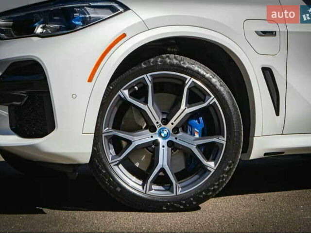 Белый БМВ Х5, объемом двигателя 3 л и пробегом 63 тыс. км за 69900 $, фото 3 на Automoto.ua