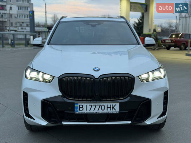 Белый БМВ Х5, объемом двигателя 3 л и пробегом 51 тыс. км за 97400 $, фото 1 на Automoto.ua