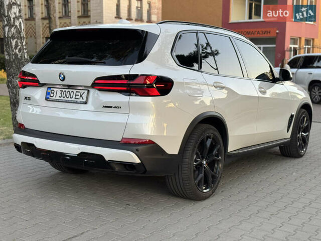 Белый БМВ Х5, объемом двигателя 3 л и пробегом 77 тыс. км за 85000 $, фото 35 на Automoto.ua