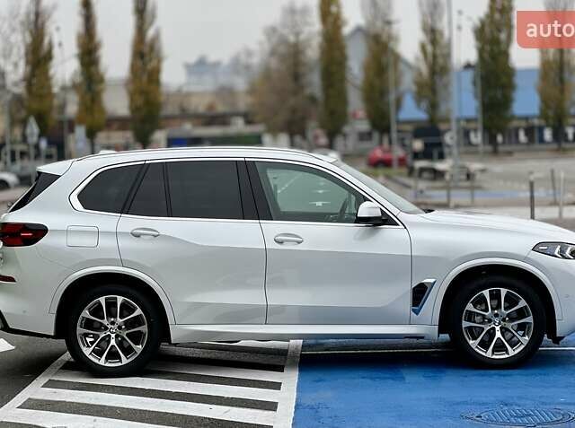 Белый БМВ Х5, объемом двигателя 3 л и пробегом 52 тыс. км за 79999 $, фото 5 на Automoto.ua