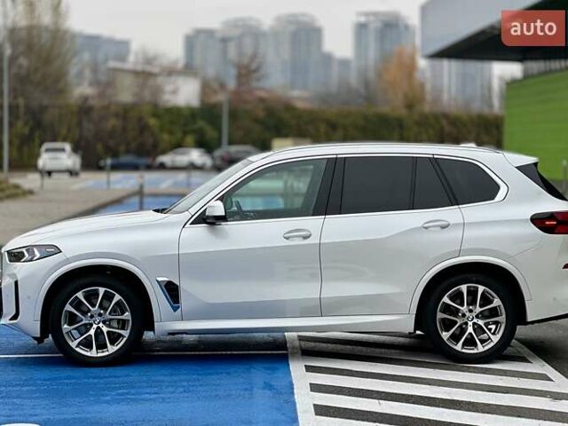 Белый БМВ Х5, объемом двигателя 3 л и пробегом 52 тыс. км за 79999 $, фото 4 на Automoto.ua