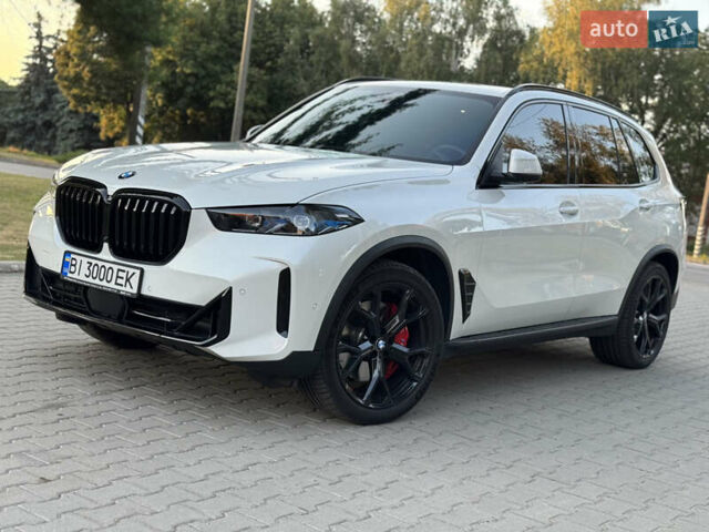 Белый БМВ Х5, объемом двигателя 3 л и пробегом 77 тыс. км за 85000 $, фото 4 на Automoto.ua