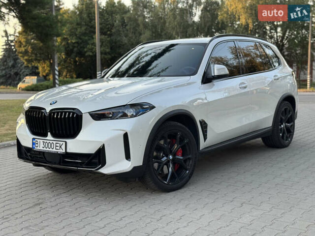 Белый БМВ Х5, объемом двигателя 3 л и пробегом 77 тыс. км за 85000 $, фото 2 на Automoto.ua