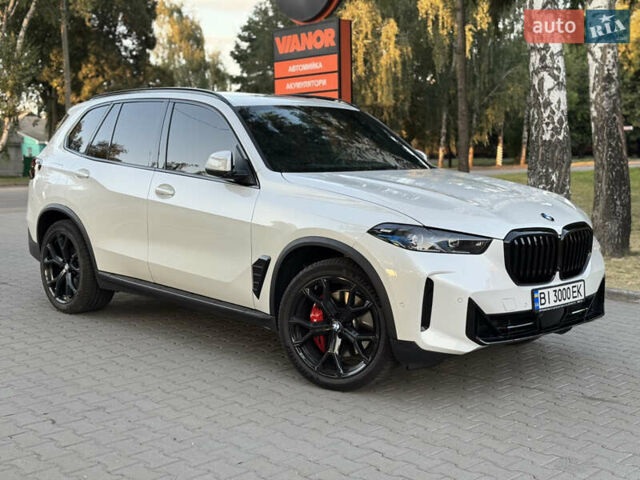 Белый БМВ Х5, объемом двигателя 3 л и пробегом 77 тыс. км за 85000 $, фото 3 на Automoto.ua