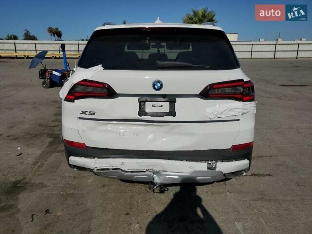Белый БМВ Х5, объемом двигателя 3 л и пробегом 67 тыс. км за 25000 $, фото 5 на Automoto.ua