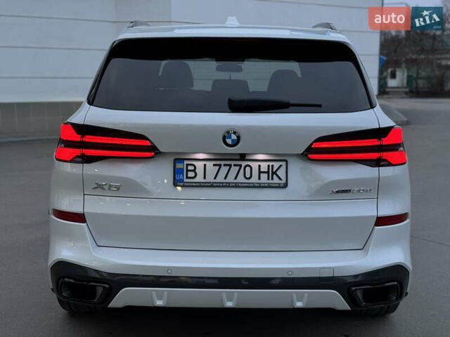 Белый БМВ Х5, объемом двигателя 3 л и пробегом 51 тыс. км за 97400 $, фото 4 на Automoto.ua