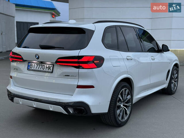 Белый БМВ Х5, объемом двигателя 3 л и пробегом 51 тыс. км за 97400 $, фото 3 на Automoto.ua